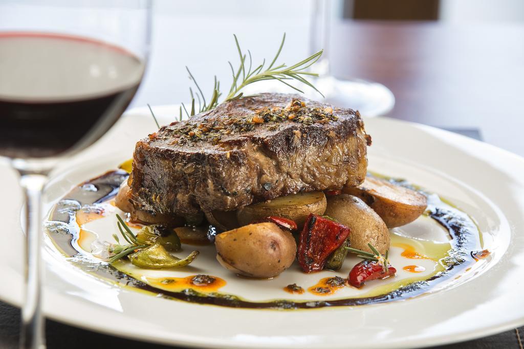 Hotel Grace Cafayate Extérieur photo A steak prepared with a dry rub